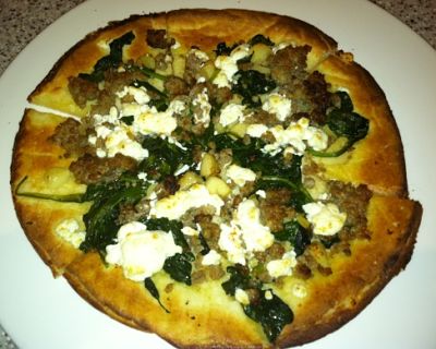 GF pizza with goat cheese and local sausage