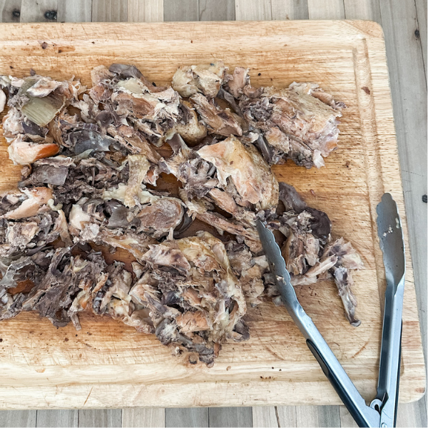 Picking Meat from Chicken Backs | Roots & Boots