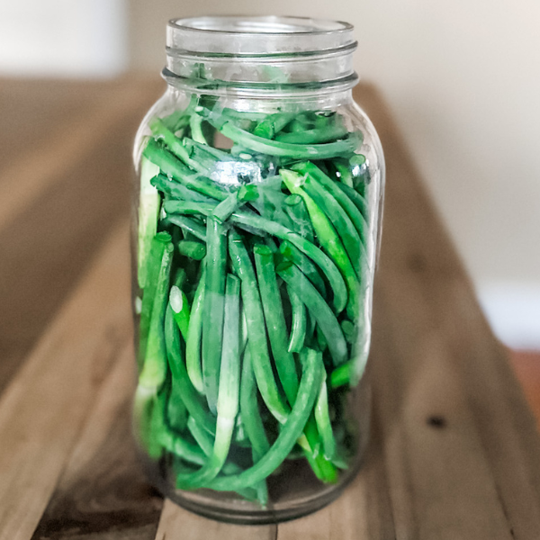 Garlic Scapes in a Jar | Roots & Boots